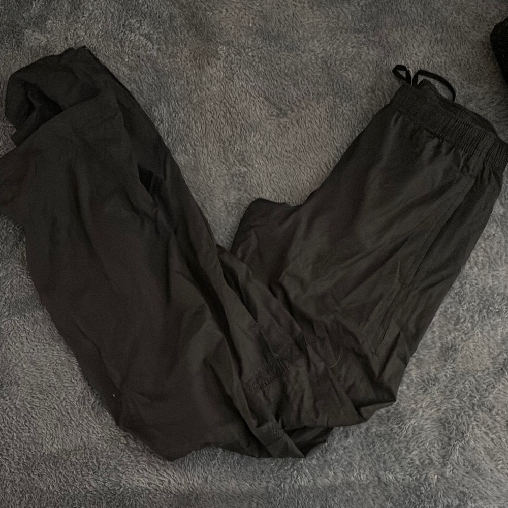 Woman’s Black Nike Track Pants